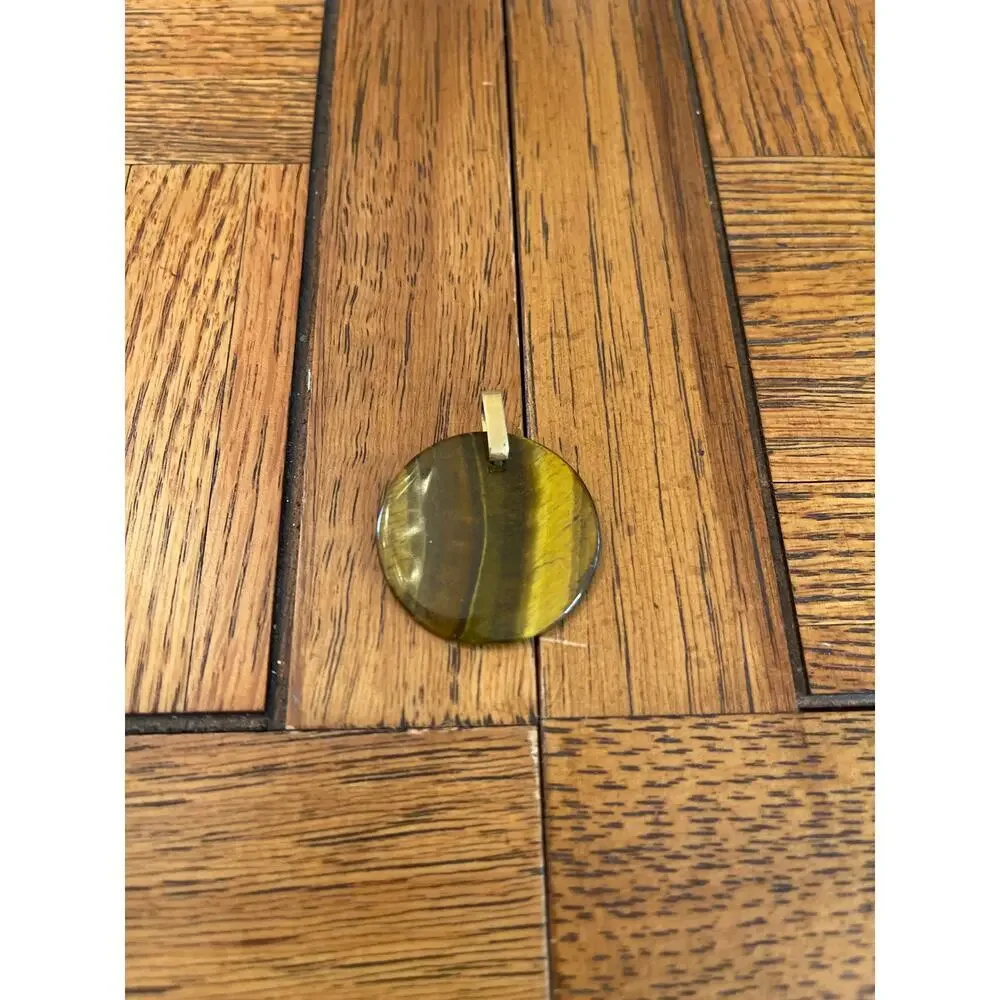 Polished tigers eye pendant